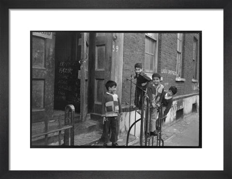 Children at the door of the Brick Lane Jamme Masjid Mosque 1976