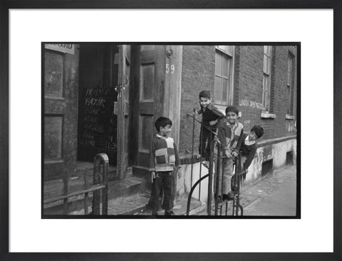 Children at the door of the Brick Lane Jamme Masjid Mosque 1976