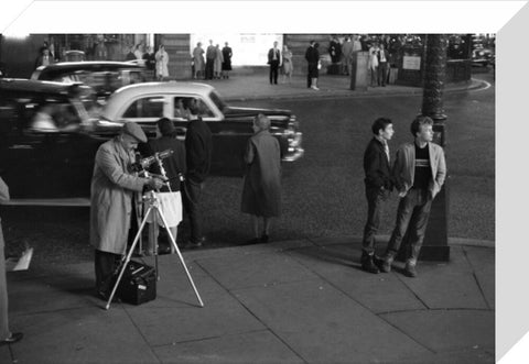 Photographer recording the nightlife c.1960