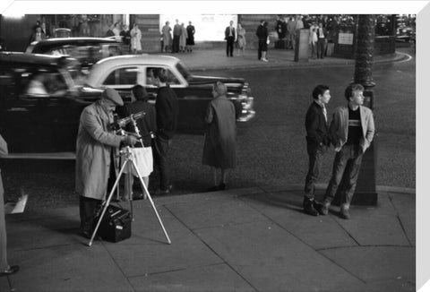 Photographer recording the nightlife c.1960