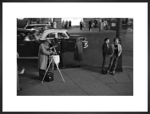 Photographer recording the nightlife c.1960