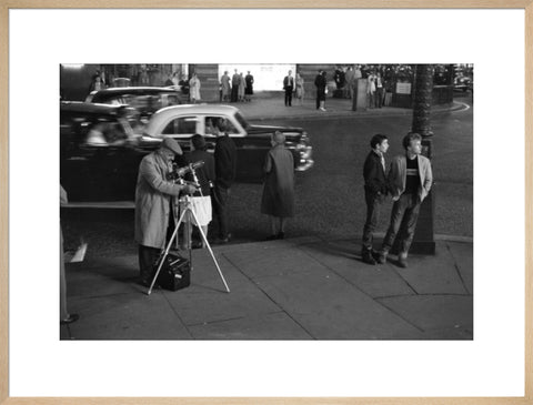 Photographer recording the nightlife c.1960