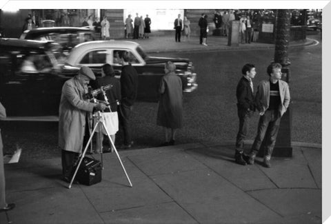 Photographer recording the nightlife c.1960