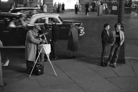 Photographer recording the nightlife c.1960