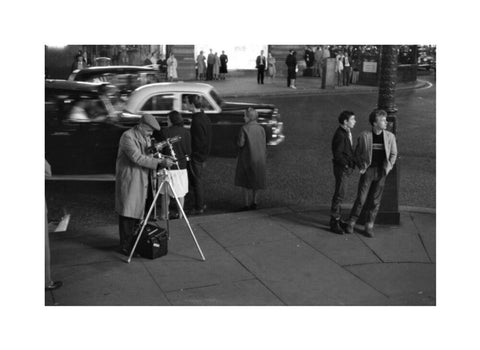 Photographer recording the nightlife c.1960