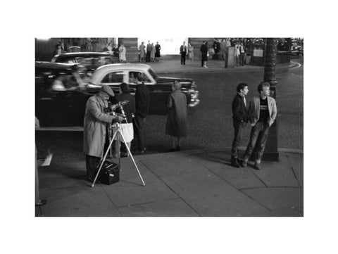 Photographer recording the nightlife c.1960