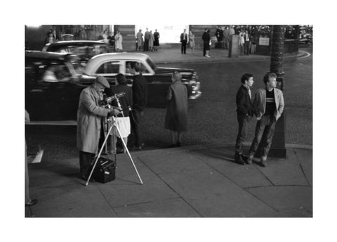 Photographer recording the nightlife c.1960