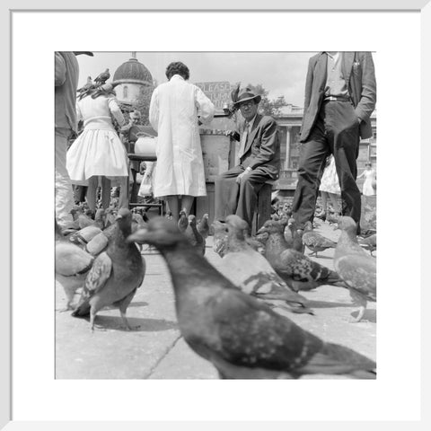 Crowds and pigeons in Trafalgar Square 1960
