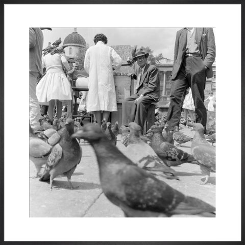 Crowds and pigeons in Trafalgar Square 1960