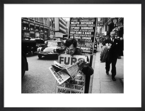 Man wearing a sandwich board 1961