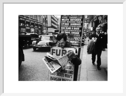 Man wearing a sandwich board 1961