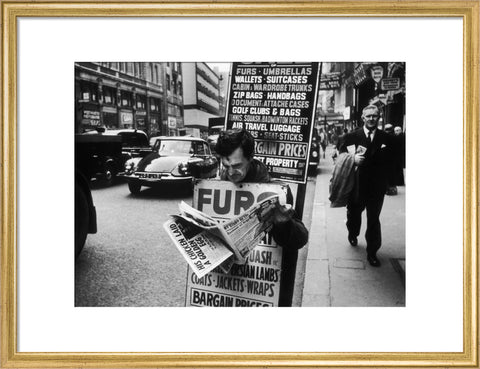 Man wearing a sandwich board 1961