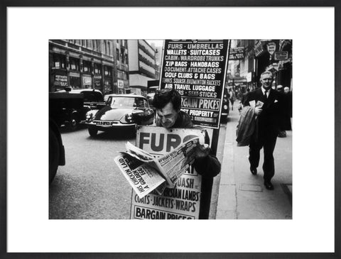 Man wearing a sandwich board 1961