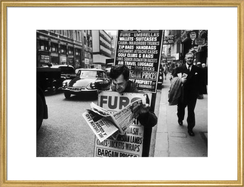 Man wearing a sandwich board 1961