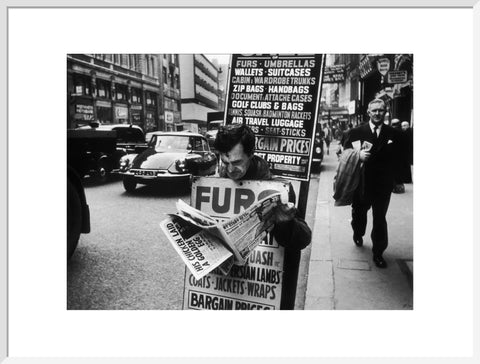 Man wearing a sandwich board 1961