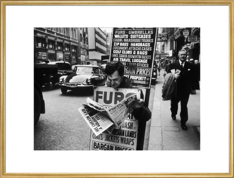 Man wearing a sandwich board 1961