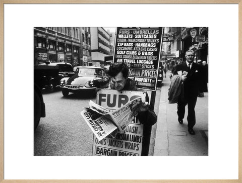 Man wearing a sandwich board 1961