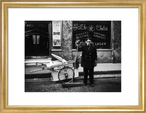 A street cleaner outside the Jack of Clubs nightclub 1961