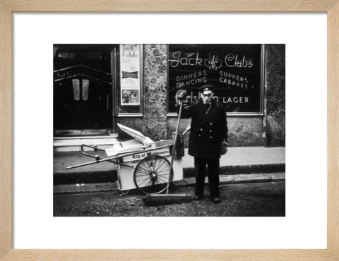 A street cleaner outside the Jack of Clubs nightclub 1961