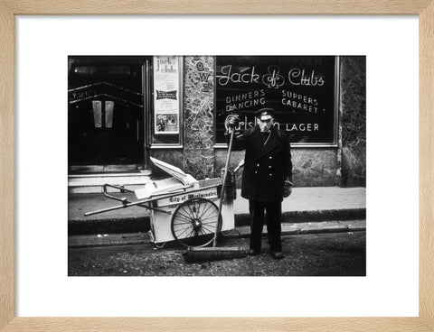 A street cleaner outside the Jack of Clubs nightclub 1961