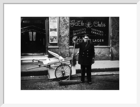 A street cleaner outside the Jack of Clubs nightclub 1961