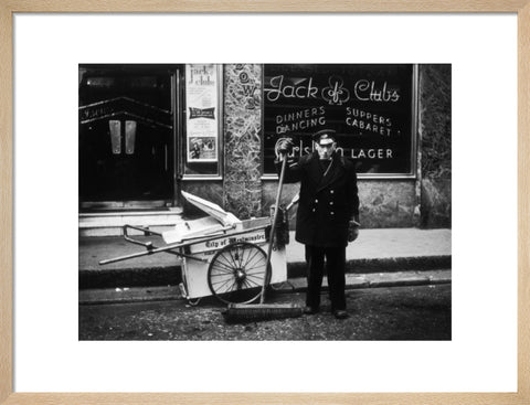 A street cleaner outside the Jack of Clubs nightclub 1961