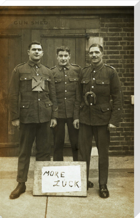 Three soldiers stand with a message of Hope c.1914