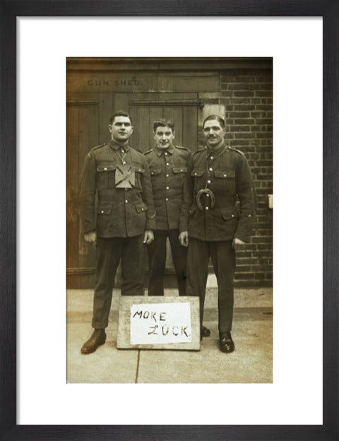 Three soldiers stand with a message of Hope c.1914