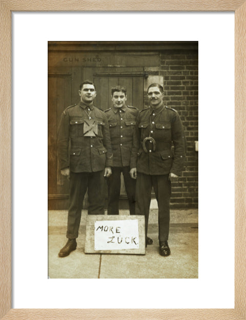 Three soldiers stand with a message of Hope c.1914