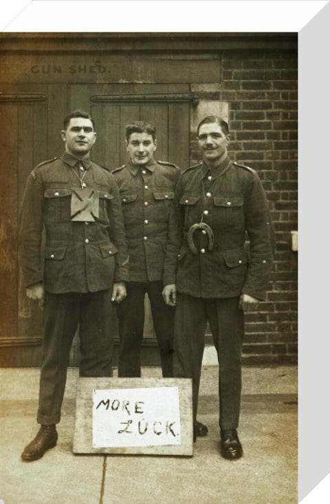 Three soldiers stand with a message of Hope c.1914