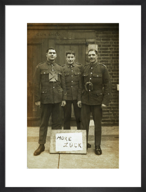 Three soldiers stand with a message of Hope c.1914