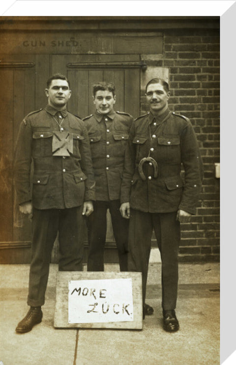 Three soldiers stand with a message of Hope c.1914