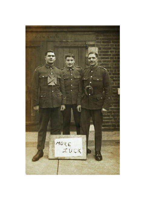 Three soldiers stand with a message of Hope c.1914