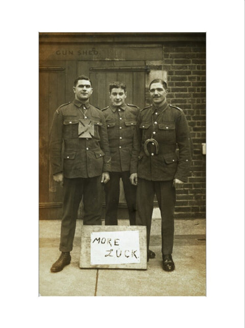 Three soldiers stand with a message of Hope c.1914