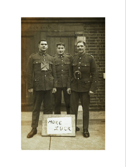 Three soldiers stand with a message of Hope c.1914