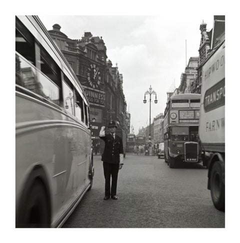 A policeman directing traffic New Oxford Street. c.1955